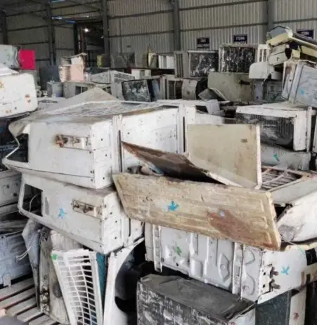 Old refrigerator shells in a shed